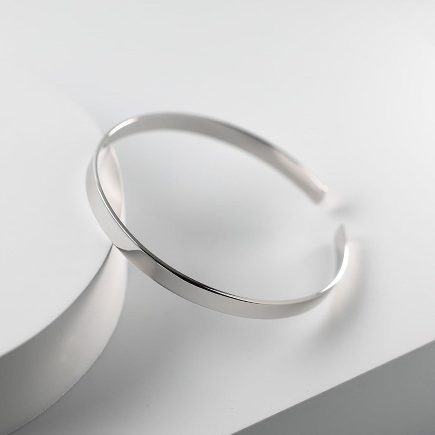 Polished cuff bangle, smooth curved silver-tone cuff bracelet