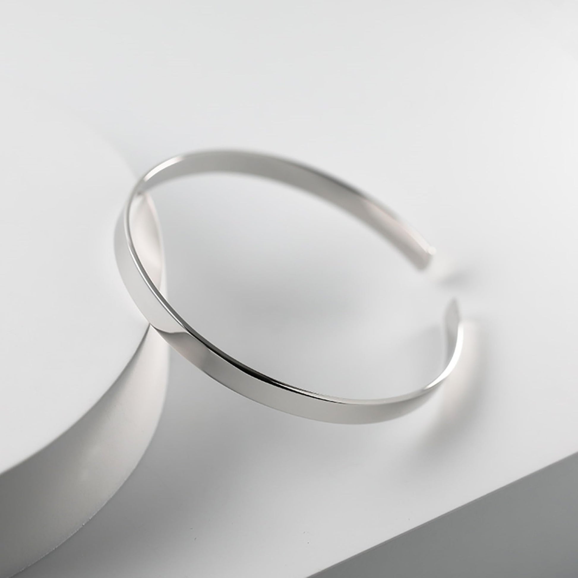 Polished cuff bangle, smooth curved silver-tone cuff bracelet
