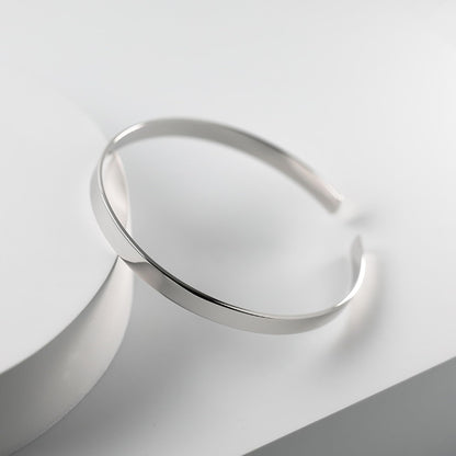 Polished cuff bangle, smooth curved silver-tone cuff bracelet