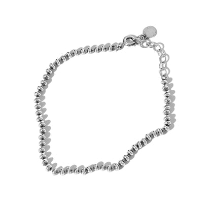 Silver-tone flat bead bracelet with round clasp and beaded link rows