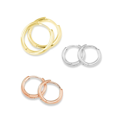 Huggie hoop earrings, 18K gold, rhodium silver, and rose gold pairs shown