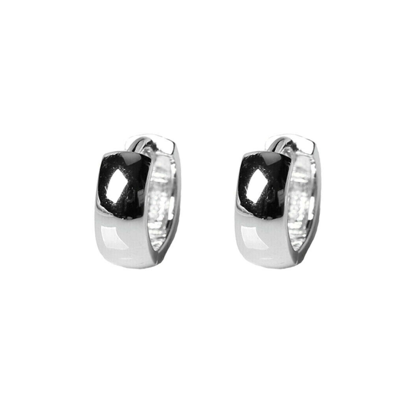 Silver-tone bold huggie hoop earrings, angled view with dark center inset