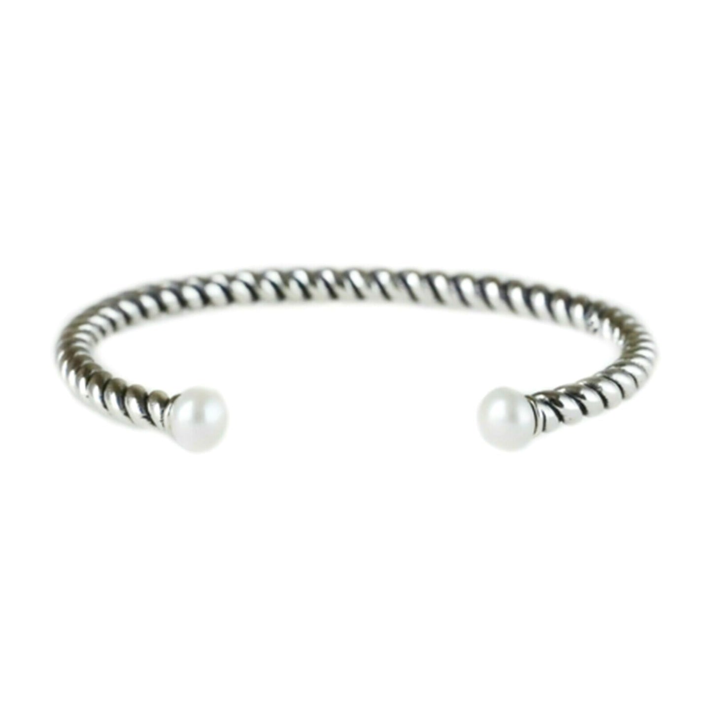 Pearl twisted torque bangle with ridged silver cuff and two white round pearls.