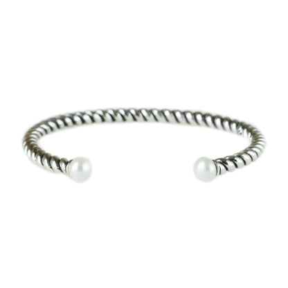 Pearl twisted torque bangle with ridged silver cuff and two white round pearls.