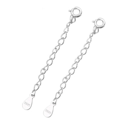 Silver curb extender chains with oval link chain and teardrop ends marked 925