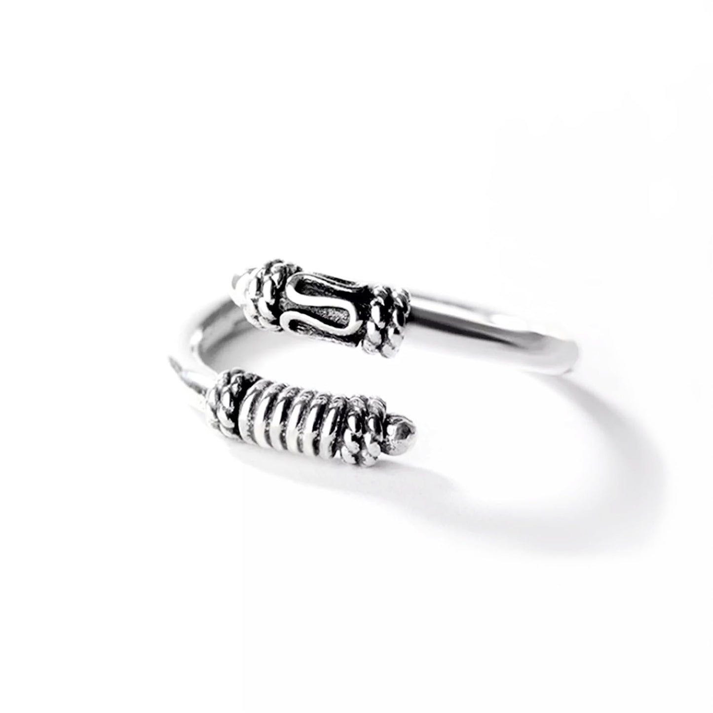 Oxidized silver totem knot ring with ridged band and raised knot detail