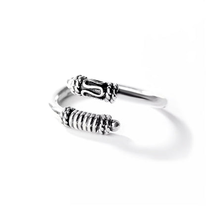 Oxidized silver totem knot ring with ridged band and raised knot detail