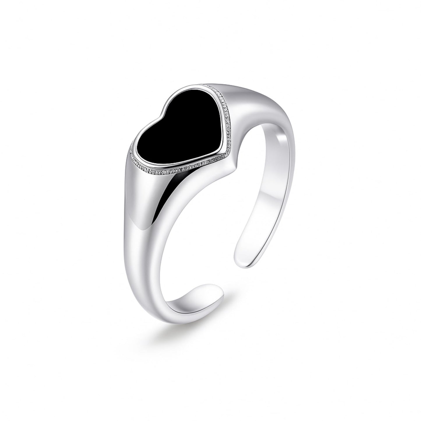 Silver heart ring with raised black center and textured band detail