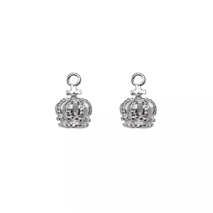 Mini crown charm pair on white background, silver-tone crowned pendants with loop bails