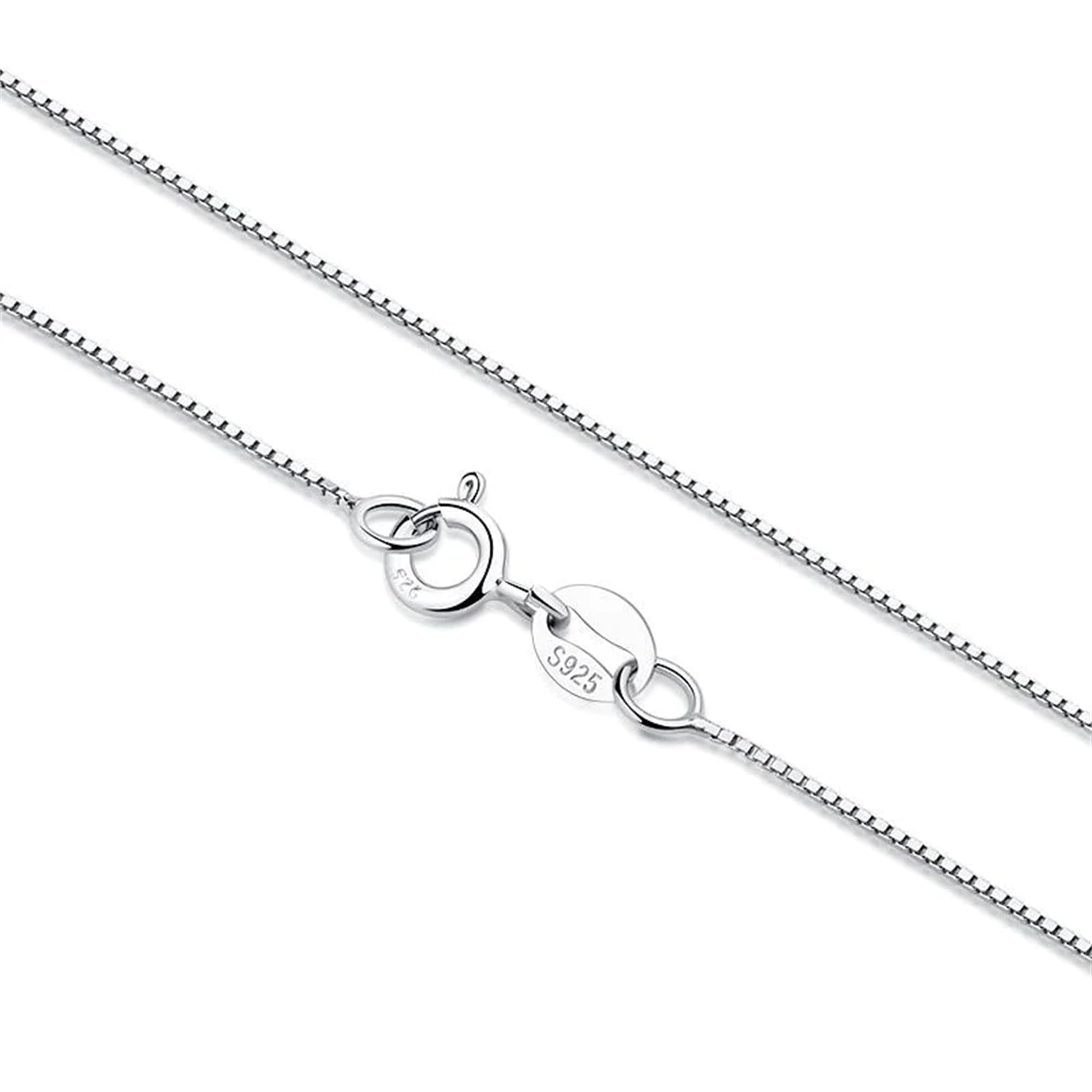 Box chain necklace with teardrop ring and clasp charms, rhodium-tone finish