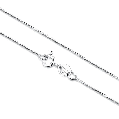 Box chain necklace with teardrop ring and clasp charms, rhodium-tone finish