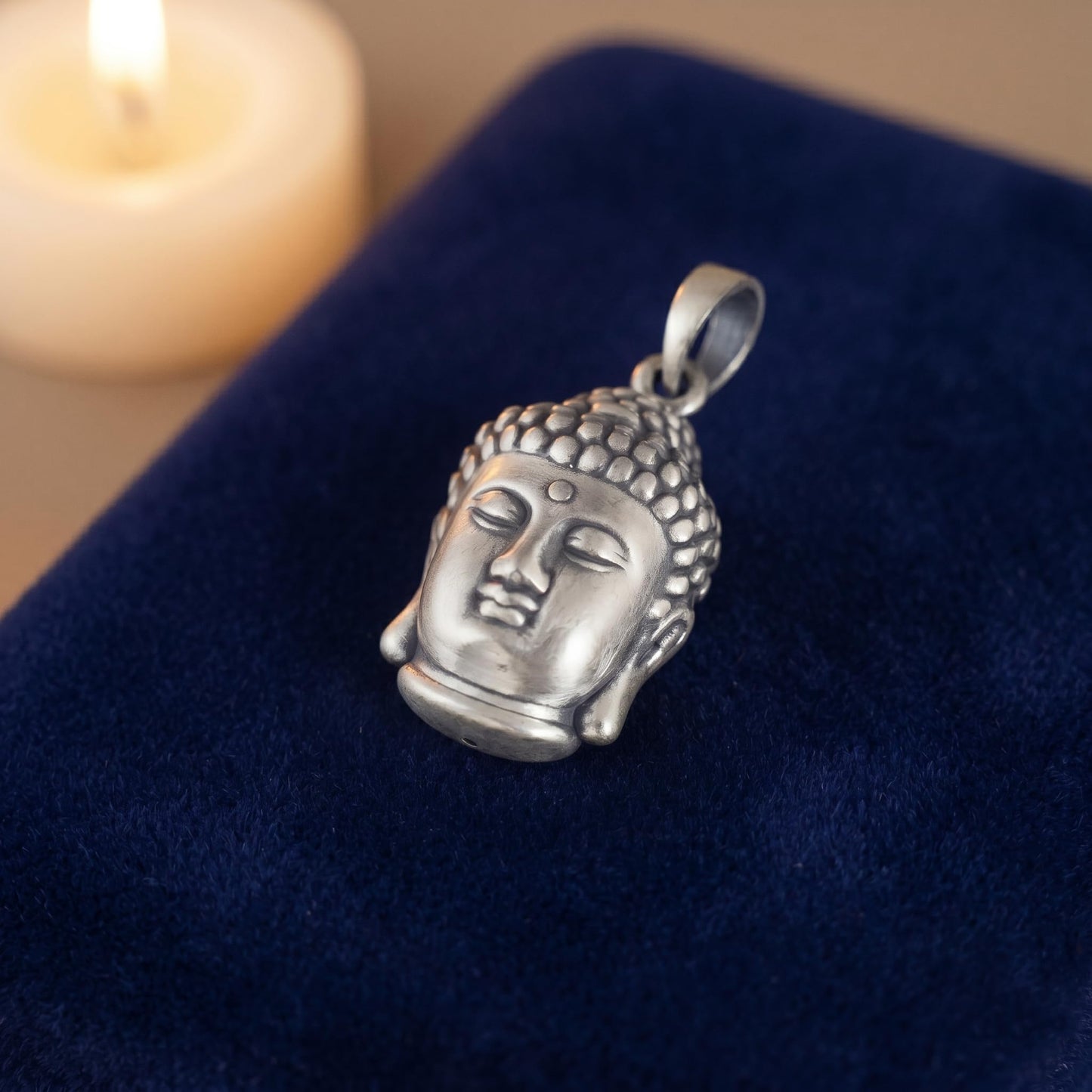 3D Buddha head pendant in silver tone with textured hair and loop bail