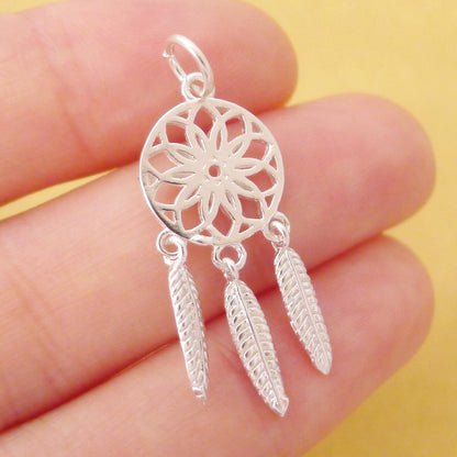 Dream Catcher Charm with red center detail, silver-tone round filigree and three feathers