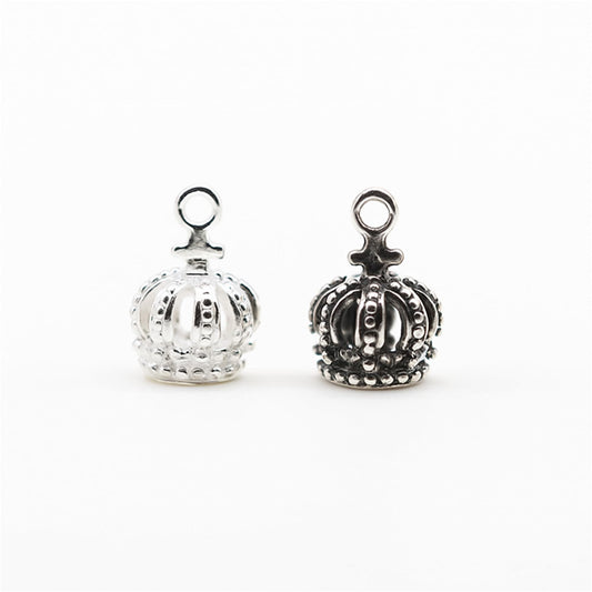 Mini Crown with Cross Charm—silver and black crown charms with cross-top loop.