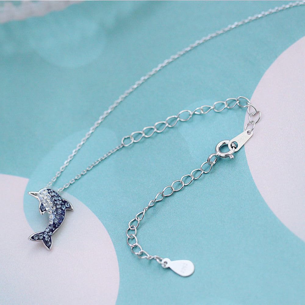 Silver curb extender chains with oval links, small charm, and teardrop 925-marked tag
