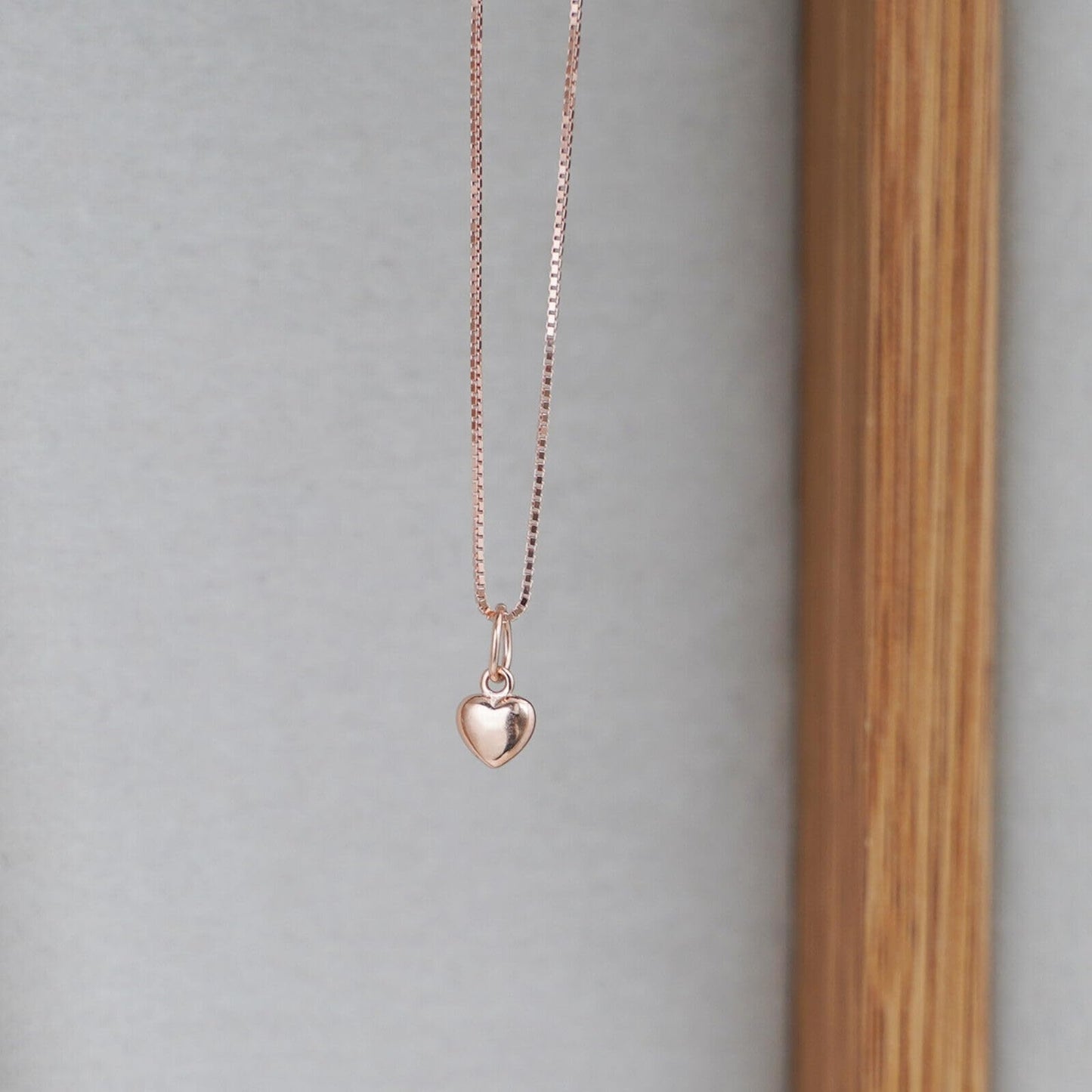 Rose gold-tone box chain necklace with heart charm pendant