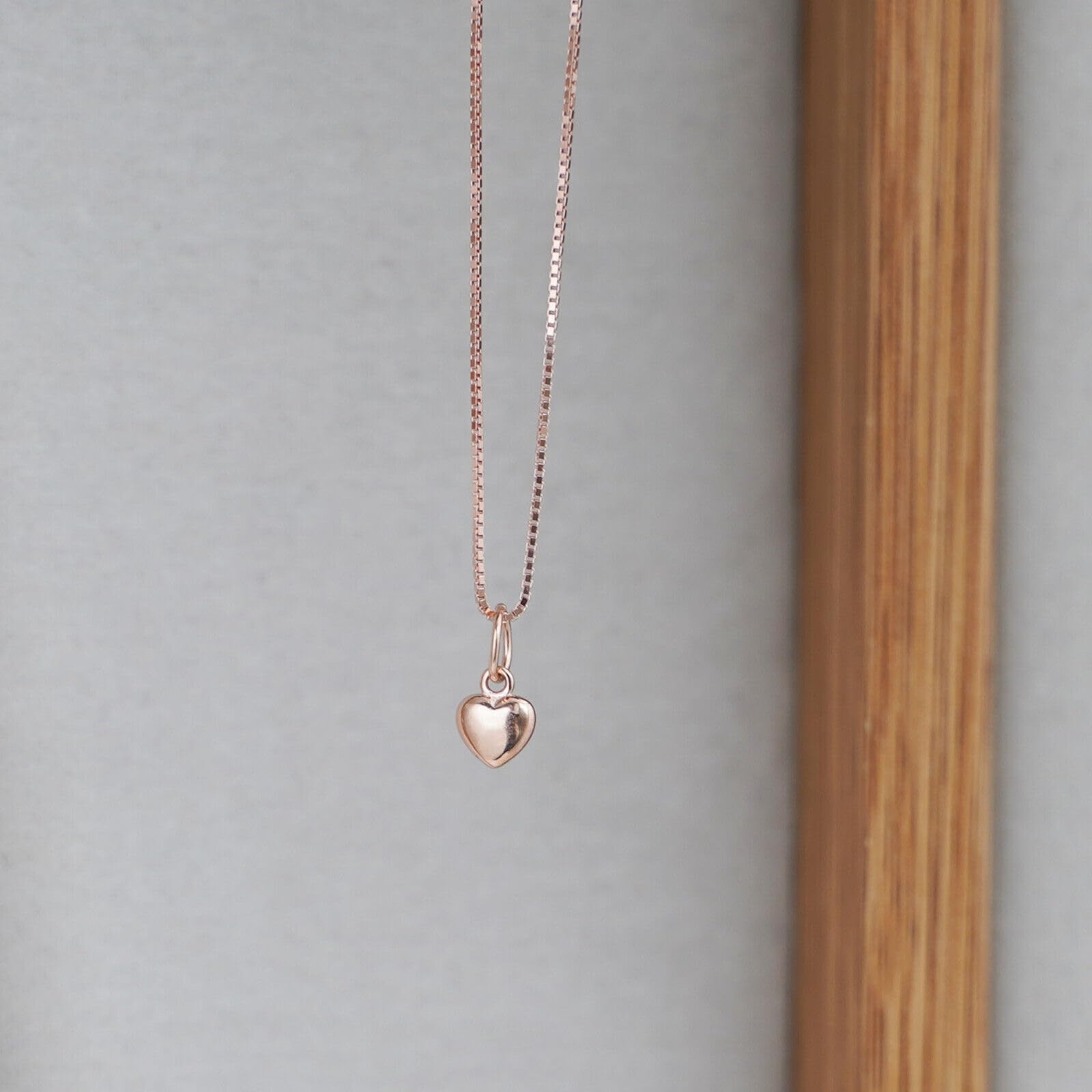 Rose gold-tone box chain necklace with heart charm pendant