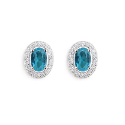 Oval halo CZ stud earrings, aquamarine-blue oval stones in silver-toned settings
