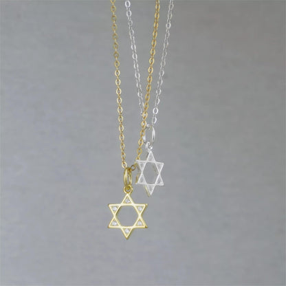 Star of David necklace set with gold and silver pendants and round gemstones
