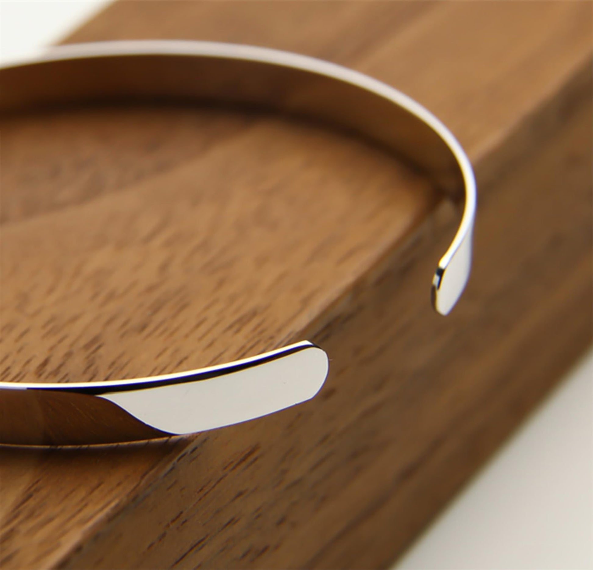 Polished cuff bangle, silver-tone hinged cuff with polished bar edge detail