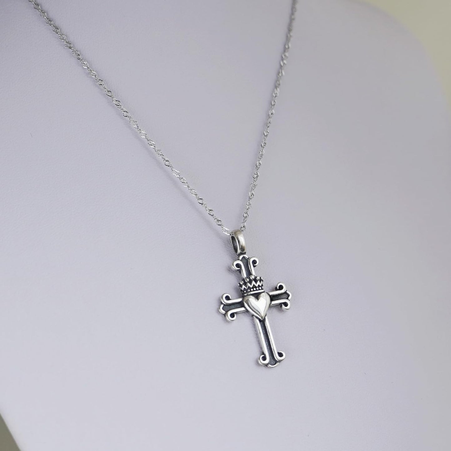 Rhodium twisted chain necklace with cross pendant