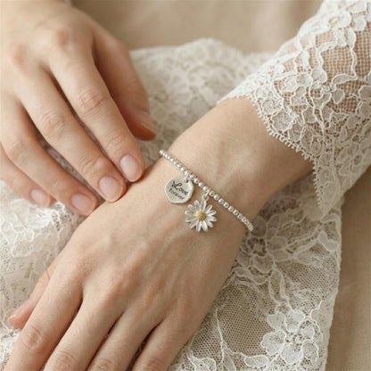 Wrist bracelet with “Love forever” hexagon charm and small daisy charm