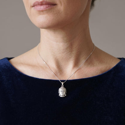 Buddha head pendant on necklace chain, silver-tone