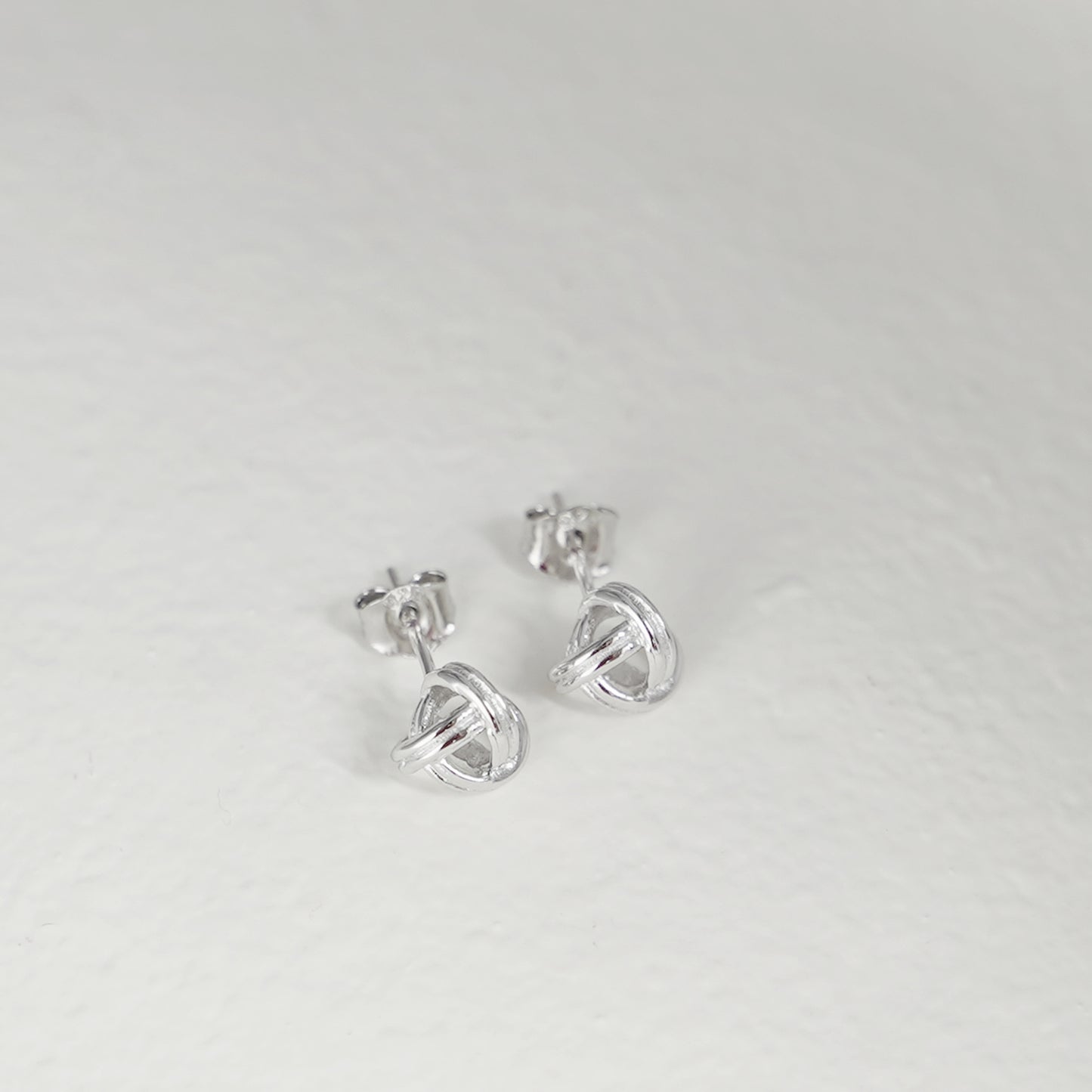 sugarkittenlondon Rhodium on Sterling Silver 7mm Double Knot Twisted Wire Love Knot Stud Earrings