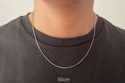 Snake chain necklace in silver, 50cm length worn at the neckline