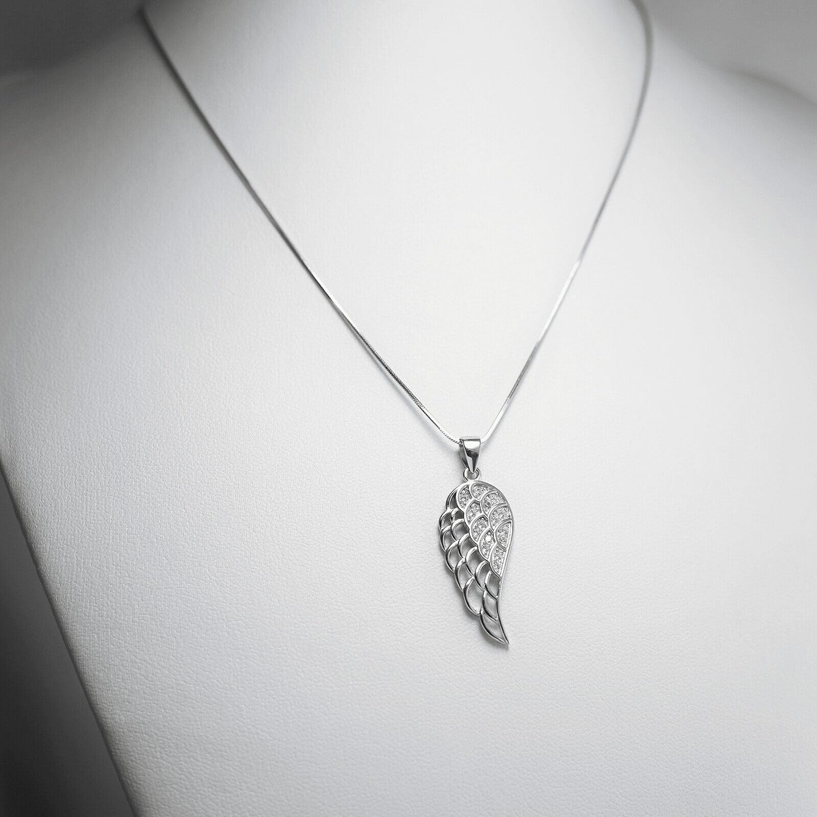 Silver snake chain necklace with wing-style leaf charm pendant