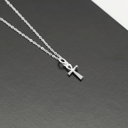 Silver ankh cross pendant charm with chain links, side view