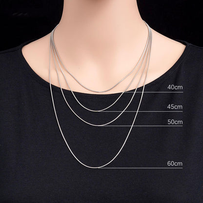 Snake chain necklace on model showing 40cm, 45cm, 50cm, and 60cm lengths