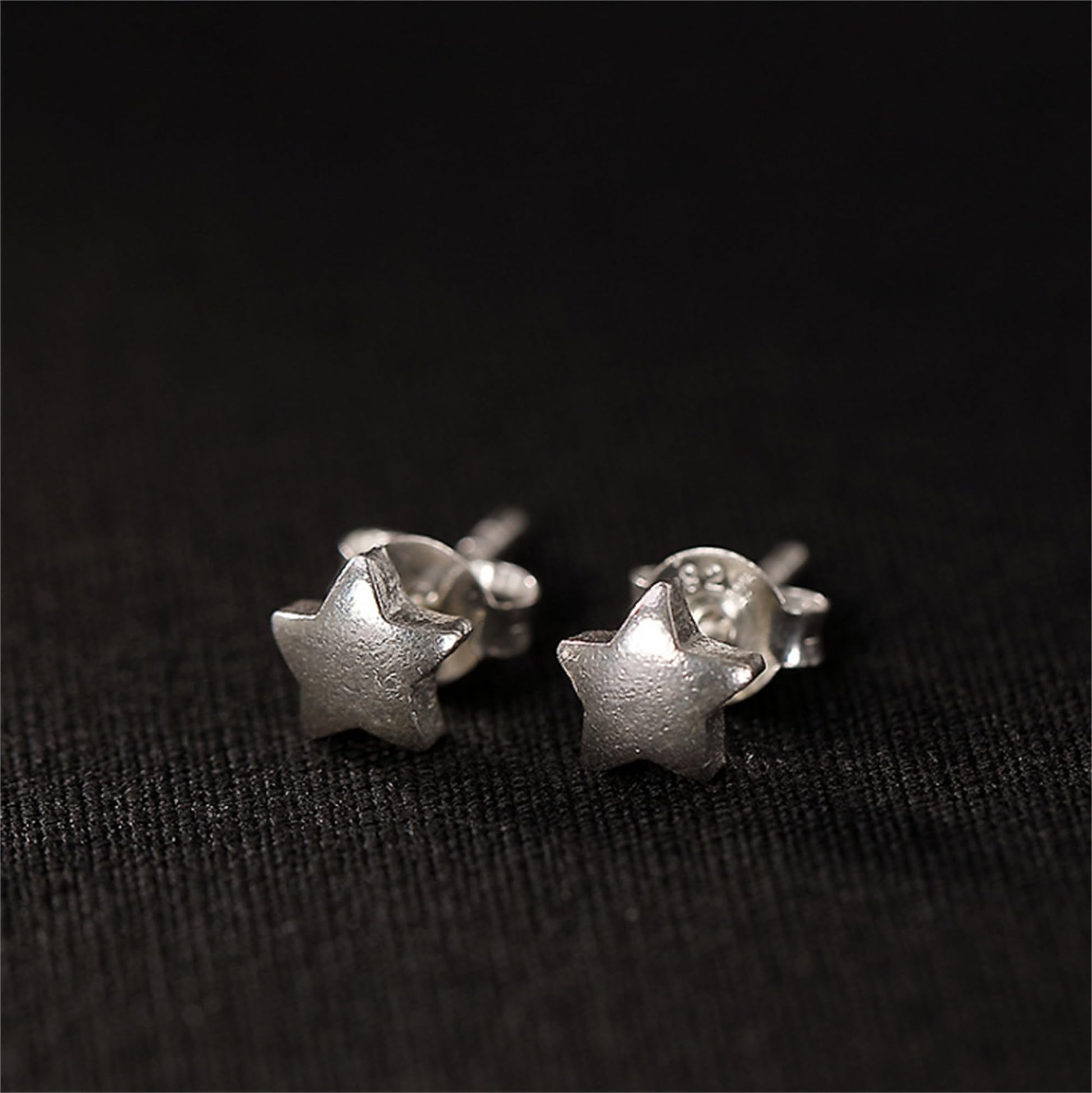 Five-point star stud earrings, silver-tone, small stud pair