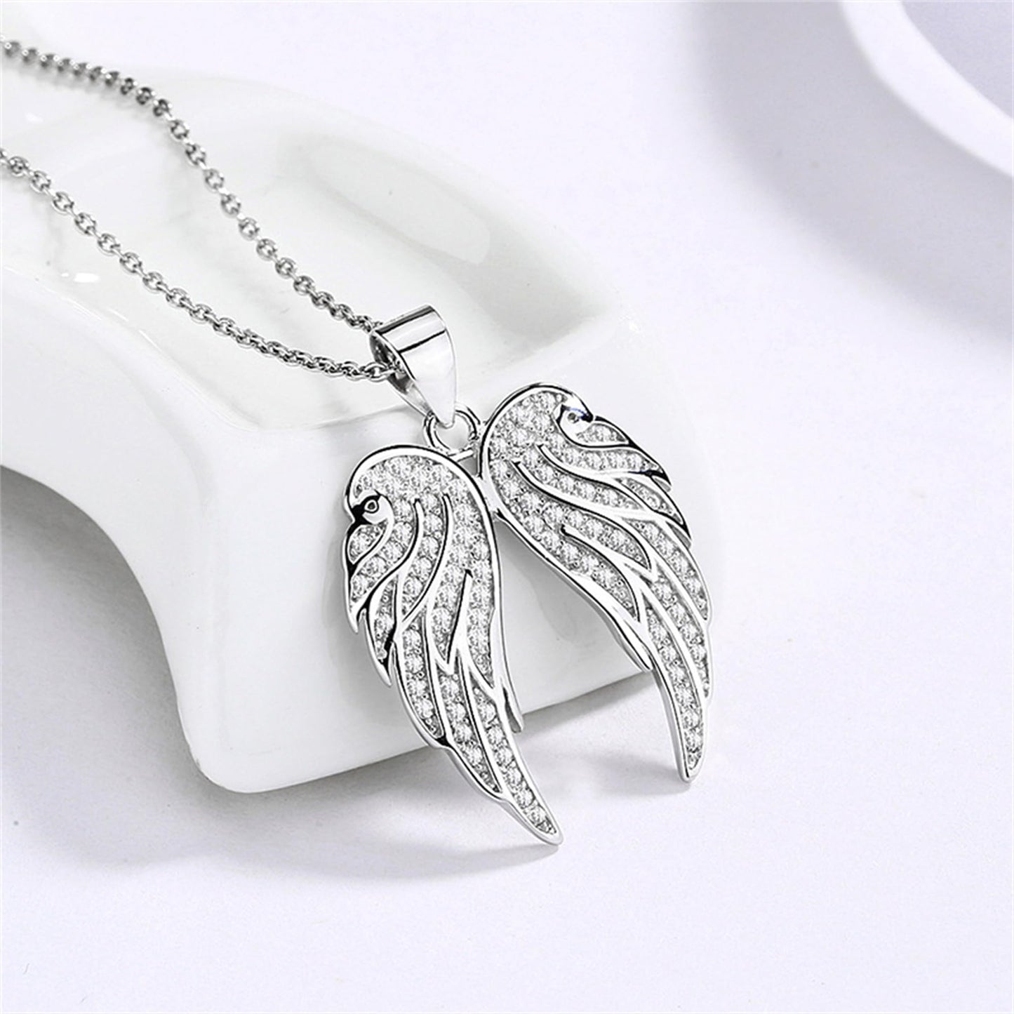 Sterling Silver Angel Feather Wing Earrings & Pendant Set with Paved CZ Stone