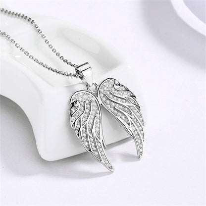 Sterling Silver Angel Feather Wing Earrings & Pendant Set with Paved CZ Stone