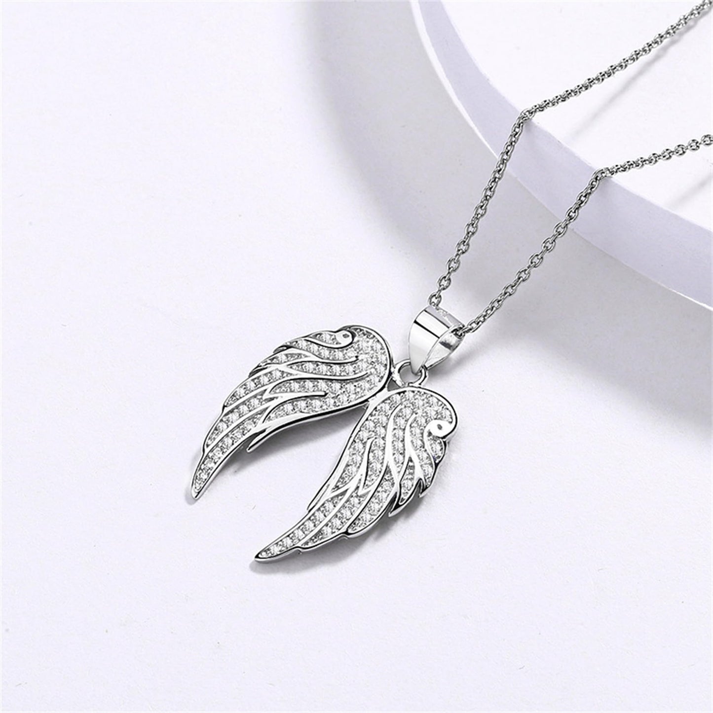 Sterling Silver Angel Feather Wing Earrings & Pendant Set with Paved CZ Stone