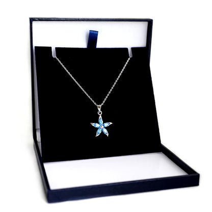Rhodium curb belcher chain necklace with blue star pendant, silver tone.