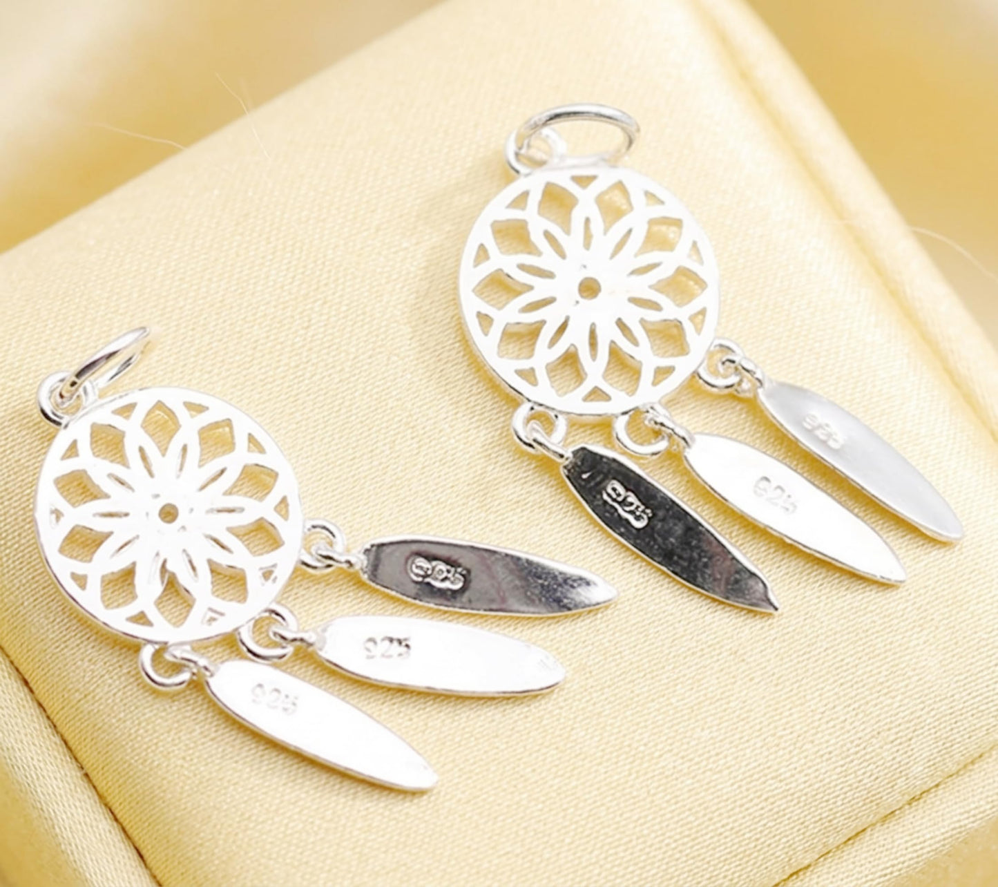Dream Catcher Charm with stamped marks, silver-tone round medallion and three feathers