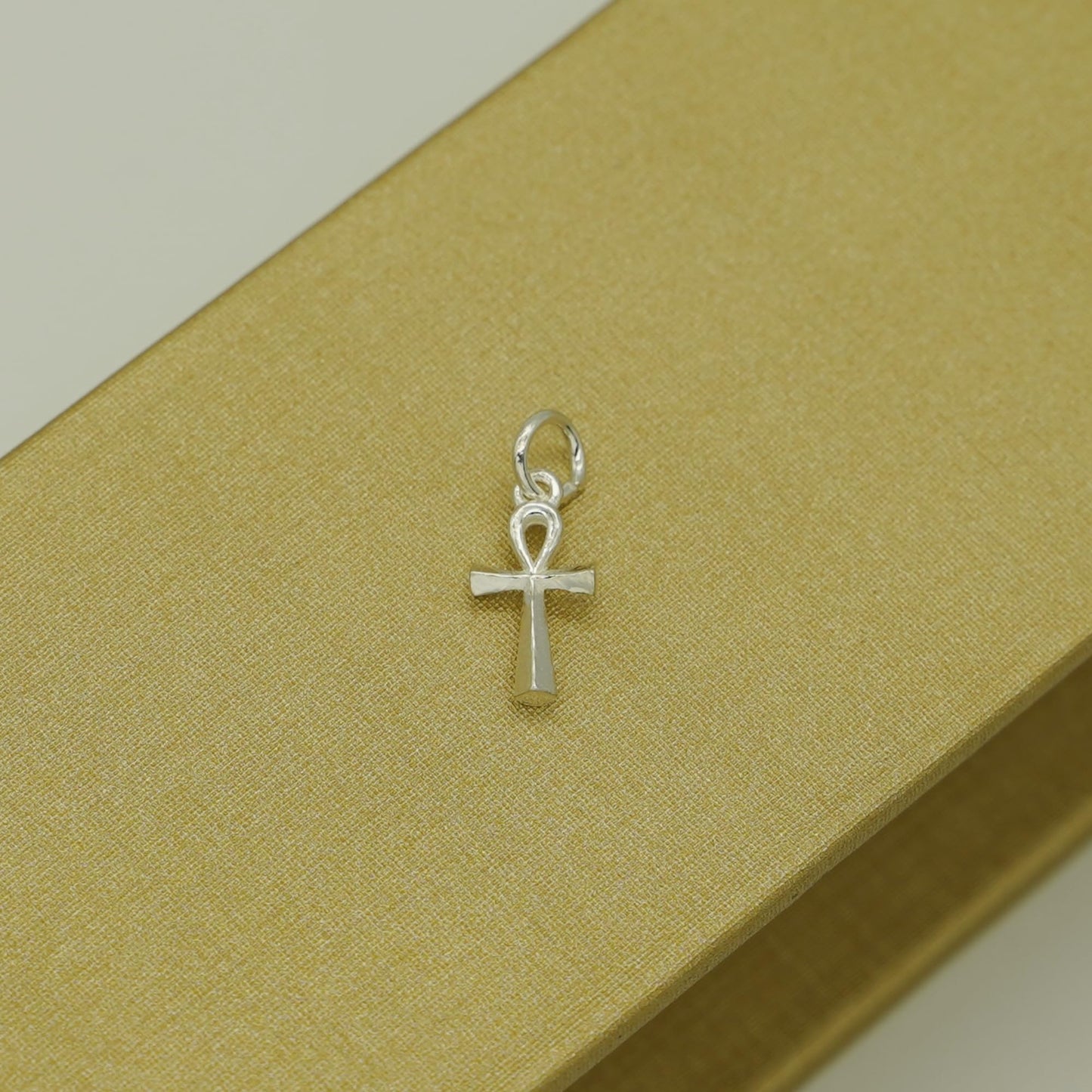 Ankh cross pendant charm on top loop, smooth silver-tone metal