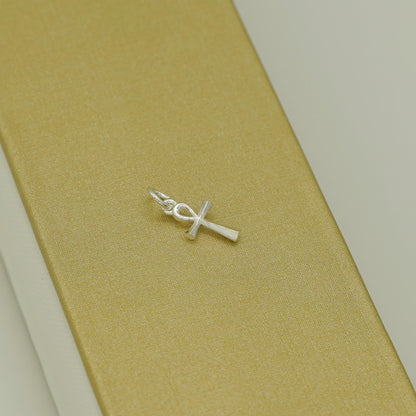 Ankh cross pendant with loop and chain connector, silver-tone metal