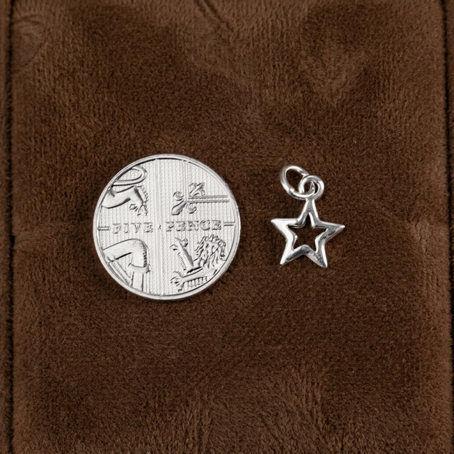 Hollow Lucky Star Charm: star pendant with loop bail and hollow center cutout