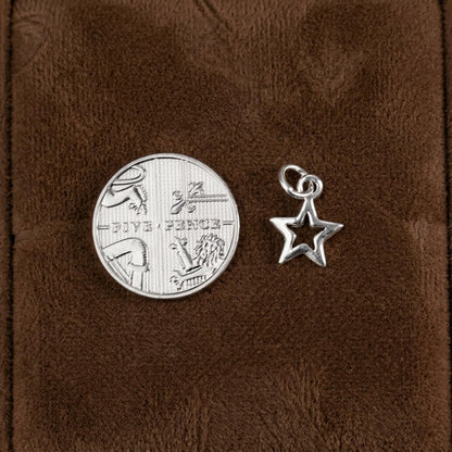 Hollow Lucky Star Charm: star pendant with loop bail and hollow center cutout