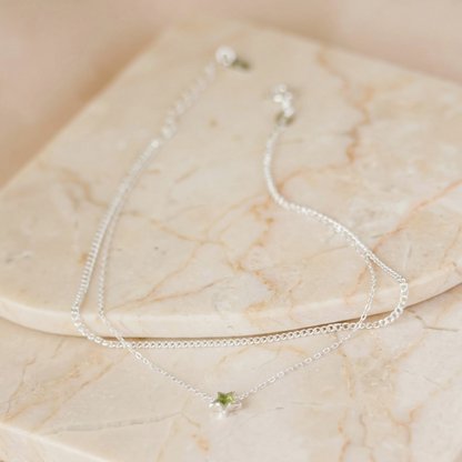 Silver anklet with two chain layers and small star charms, adjustable length