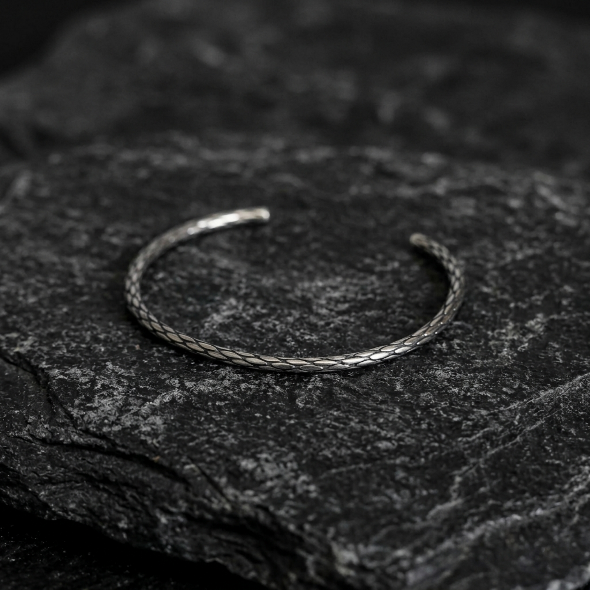 Snake-knot cuff bangle, silver-toned braided cuff with snake-knot detail