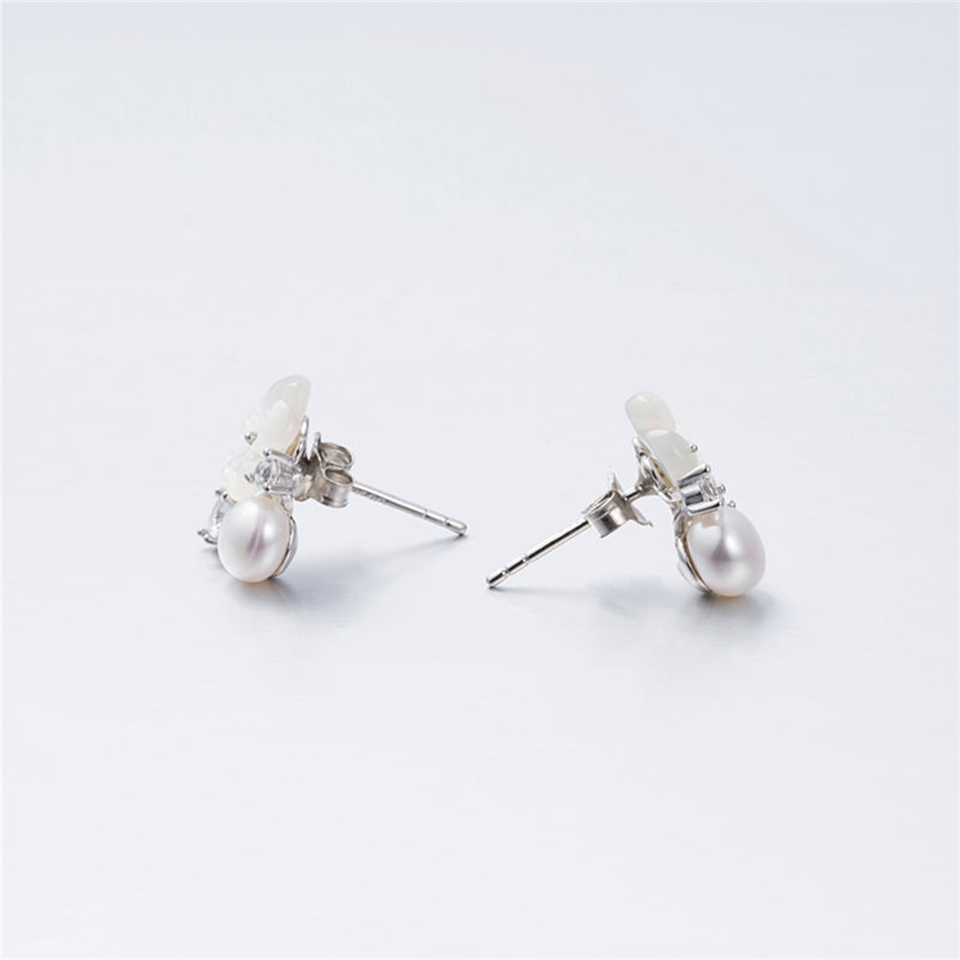 Sterling Silver Mother of Pearl Earrings with CZ Leaf and Dainty Pearl Follower - sugarkittenlondon
