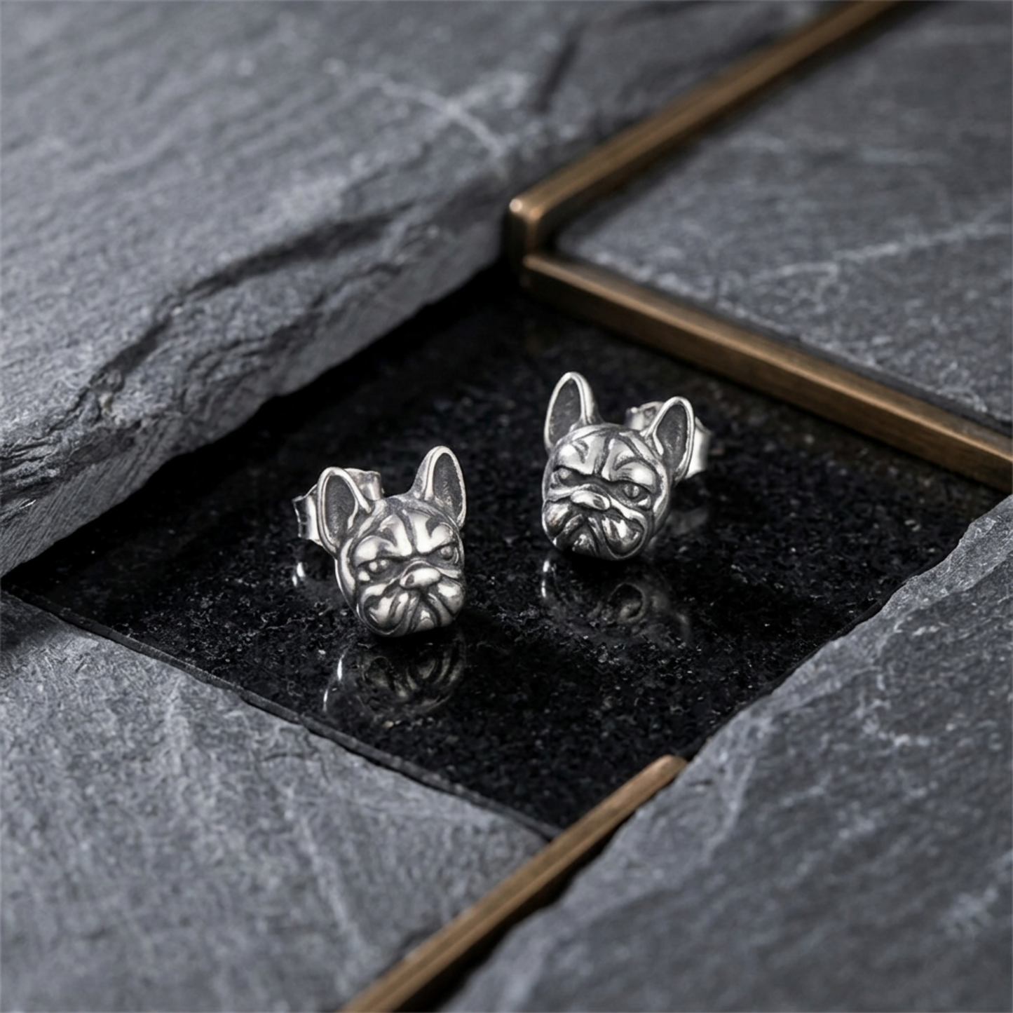 Oxidised bulldog stud earrings on dark insert, silver-tone dog face studs