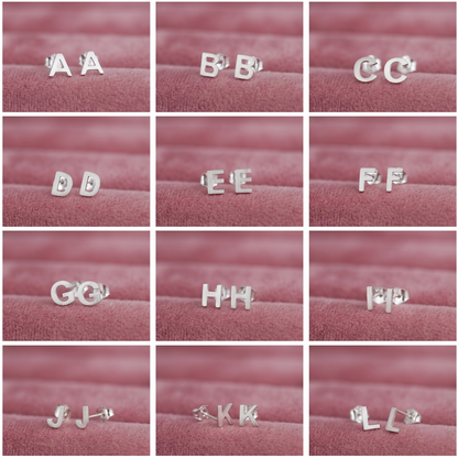 Alphabet letter stud earrings display, silver-tone pair studs for A–L