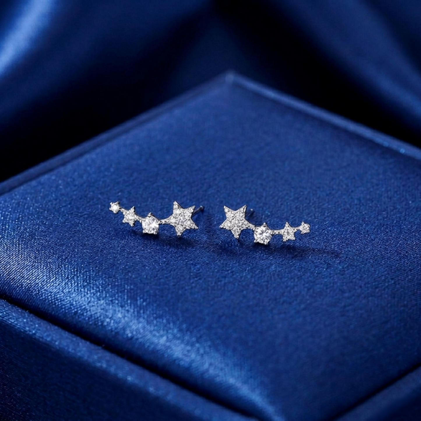 Star CZ ear climbers with linked stars and small stone clusters