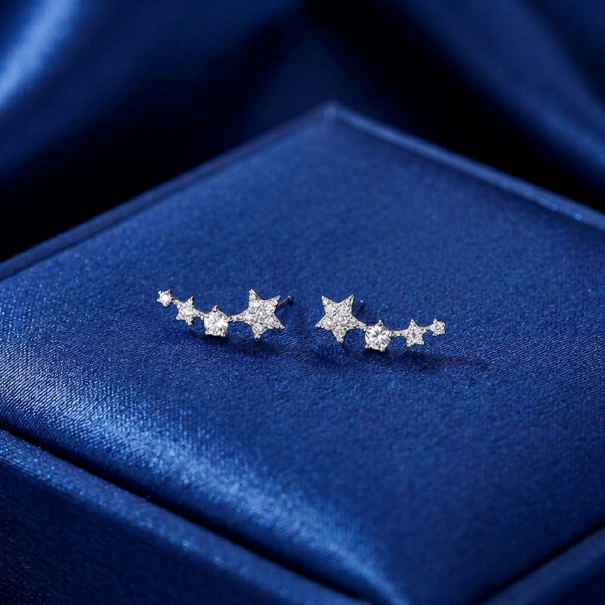 Star CZ ear climbers with linked stars and small stone clusters