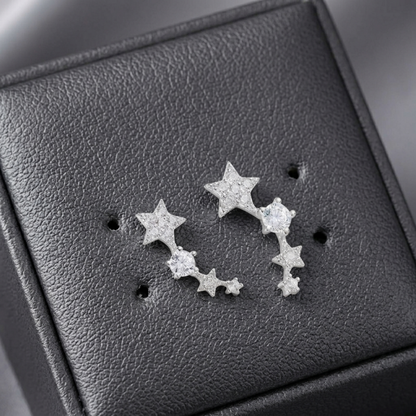 CZ star ear climbers on earring card, three linked stars with small stones